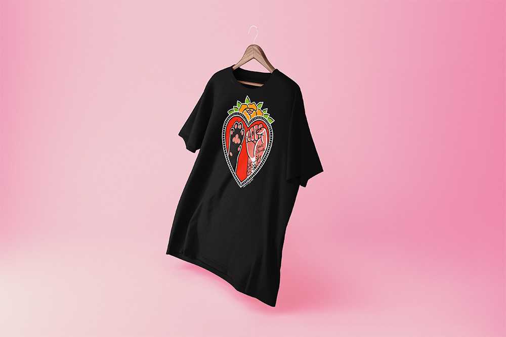 Musta t-paita, jossa punaisen sydämen sisällä nyrkki ja tassu